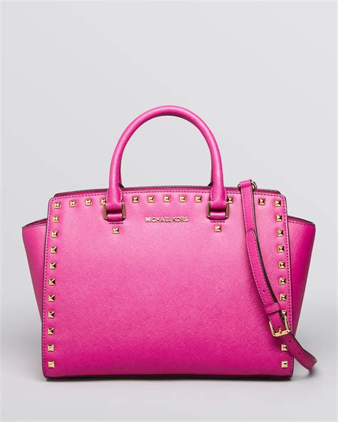 michael kors pink selma satchel|Michael Kors pink studded purse.